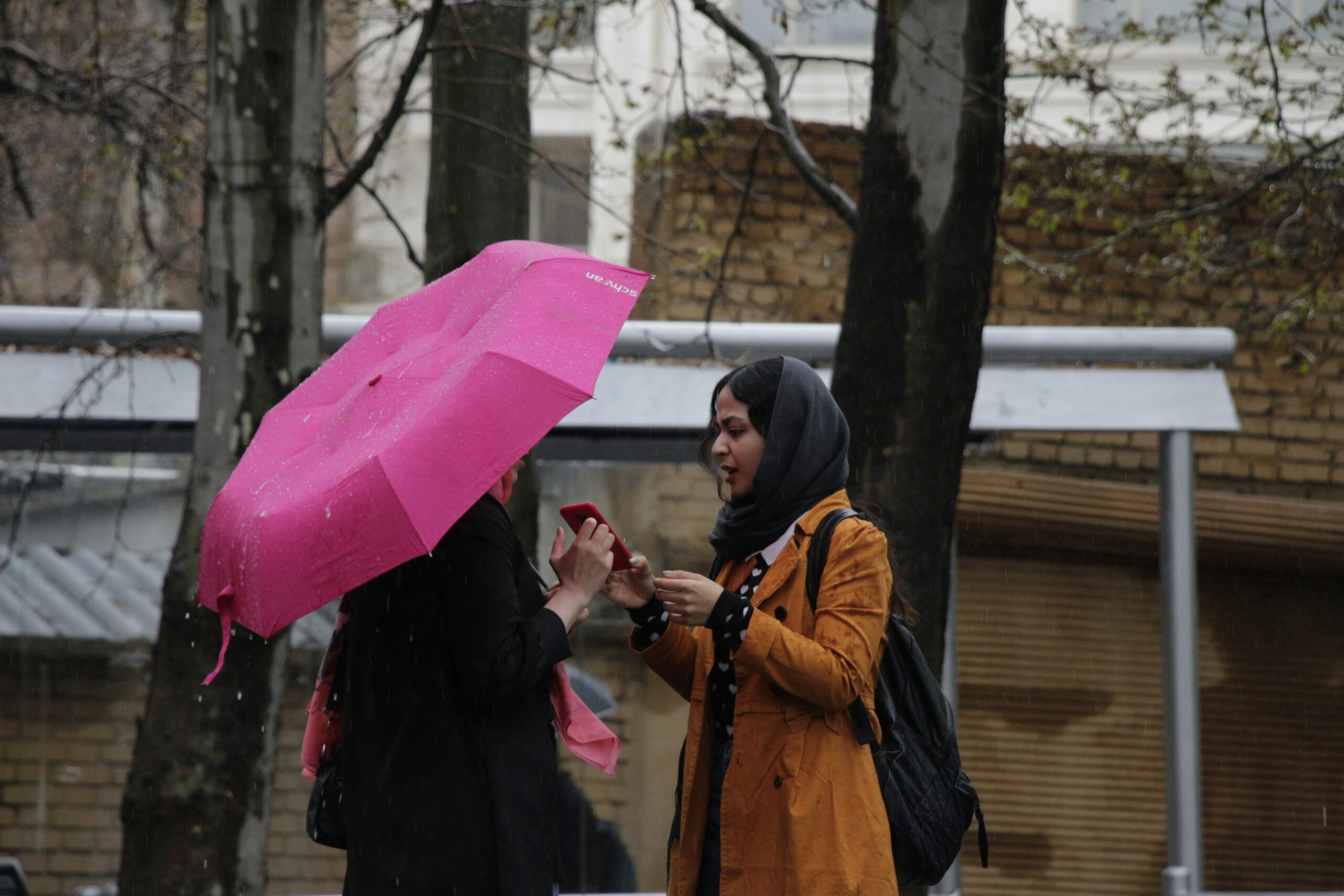A woman wearing rainproof makeup on a rainy day