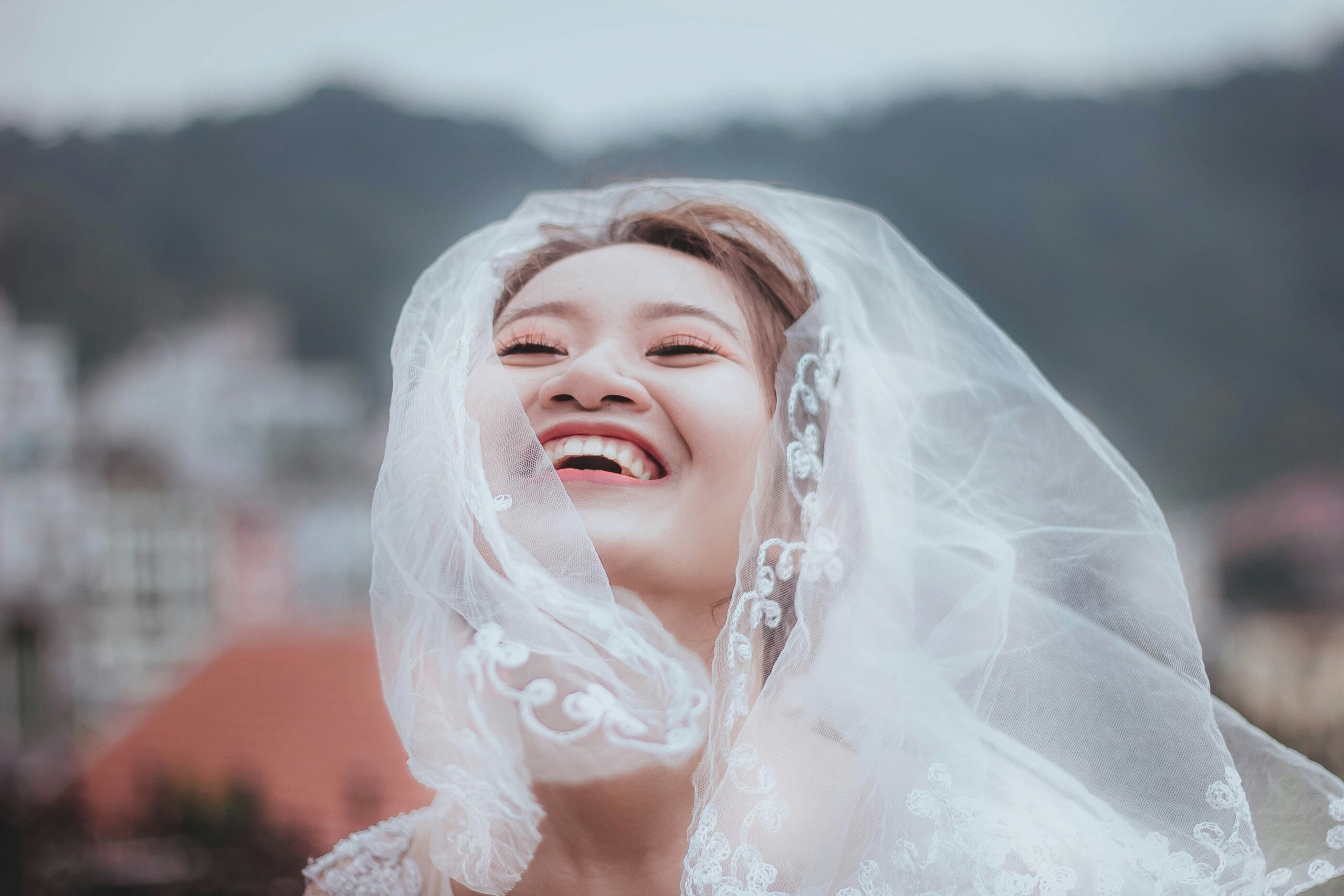 Bride smiling confidently despite extreme heat conditions