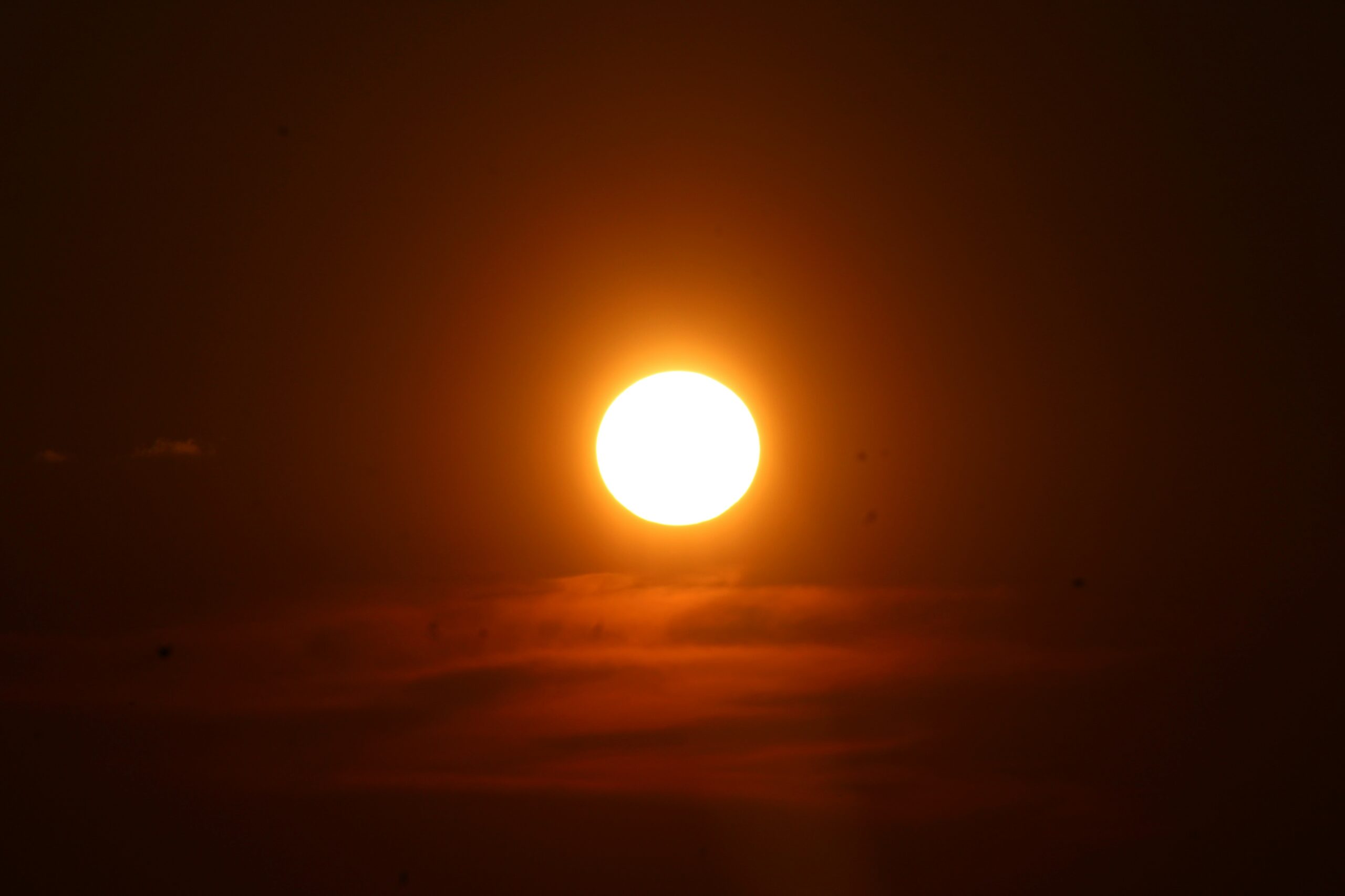 A close-up image showing makeup melting due to humidity.