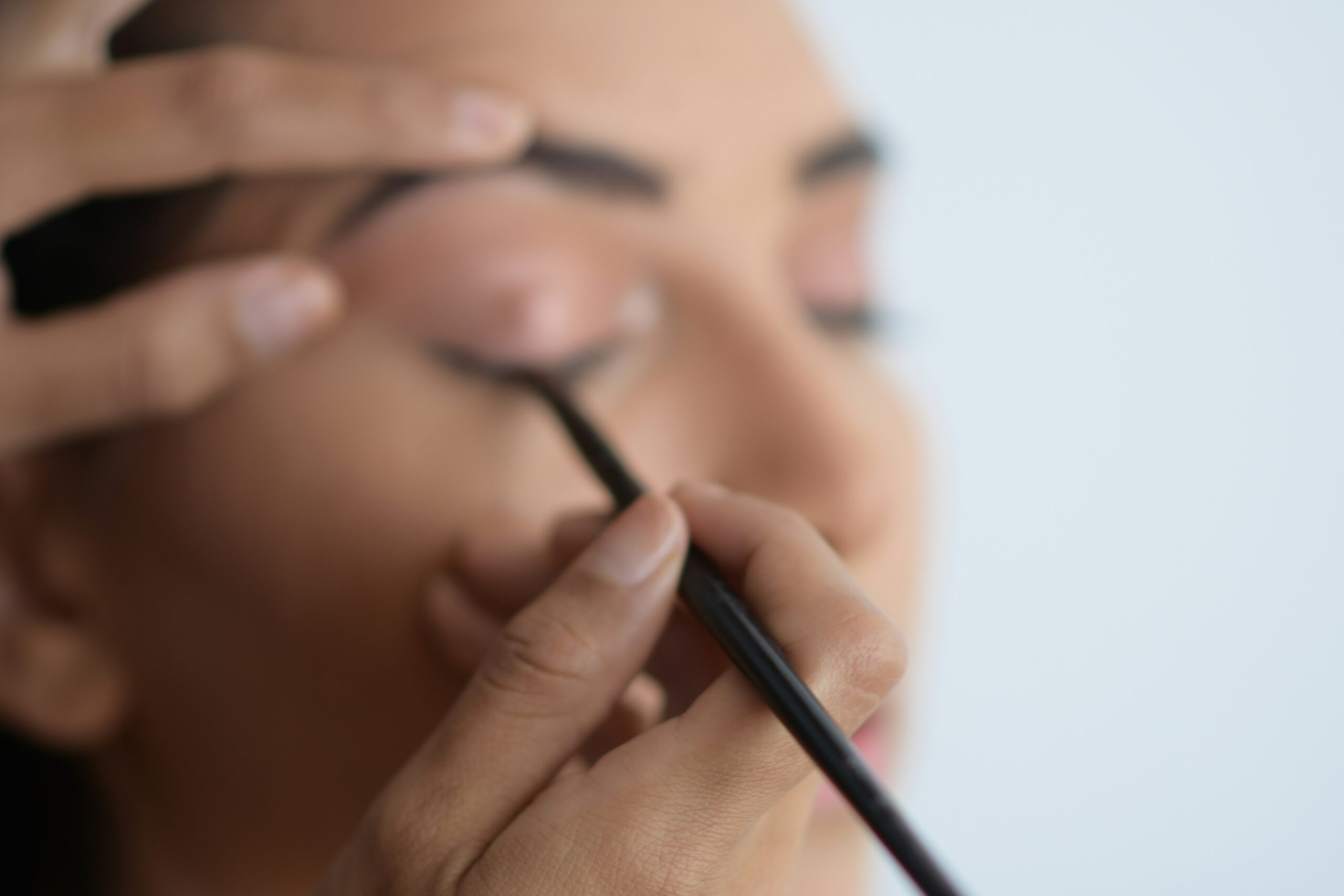 Step-by-step visual guide of applying waterproof eye makeup