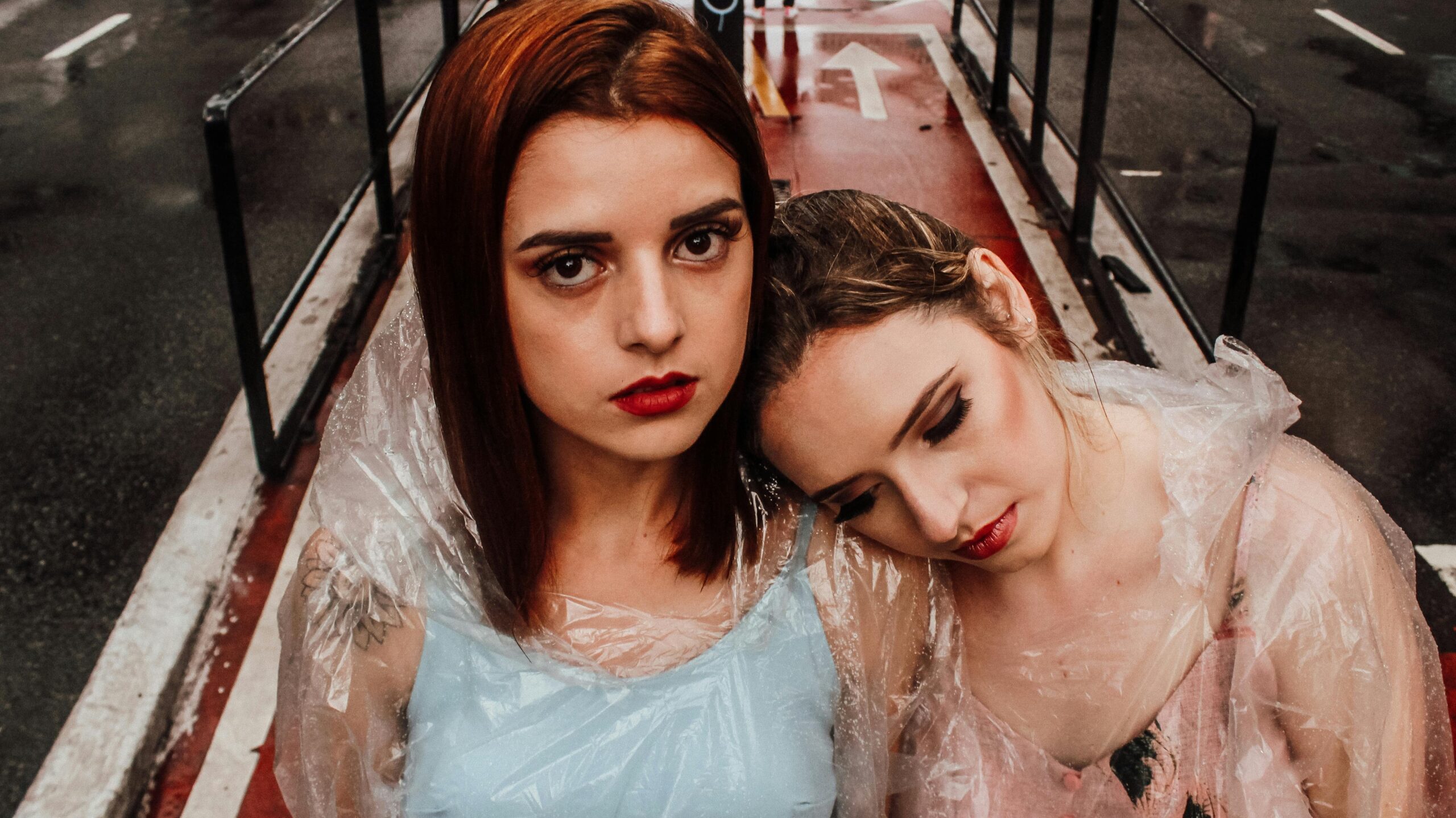 Woman wearing waterproof makeup in heavy rain