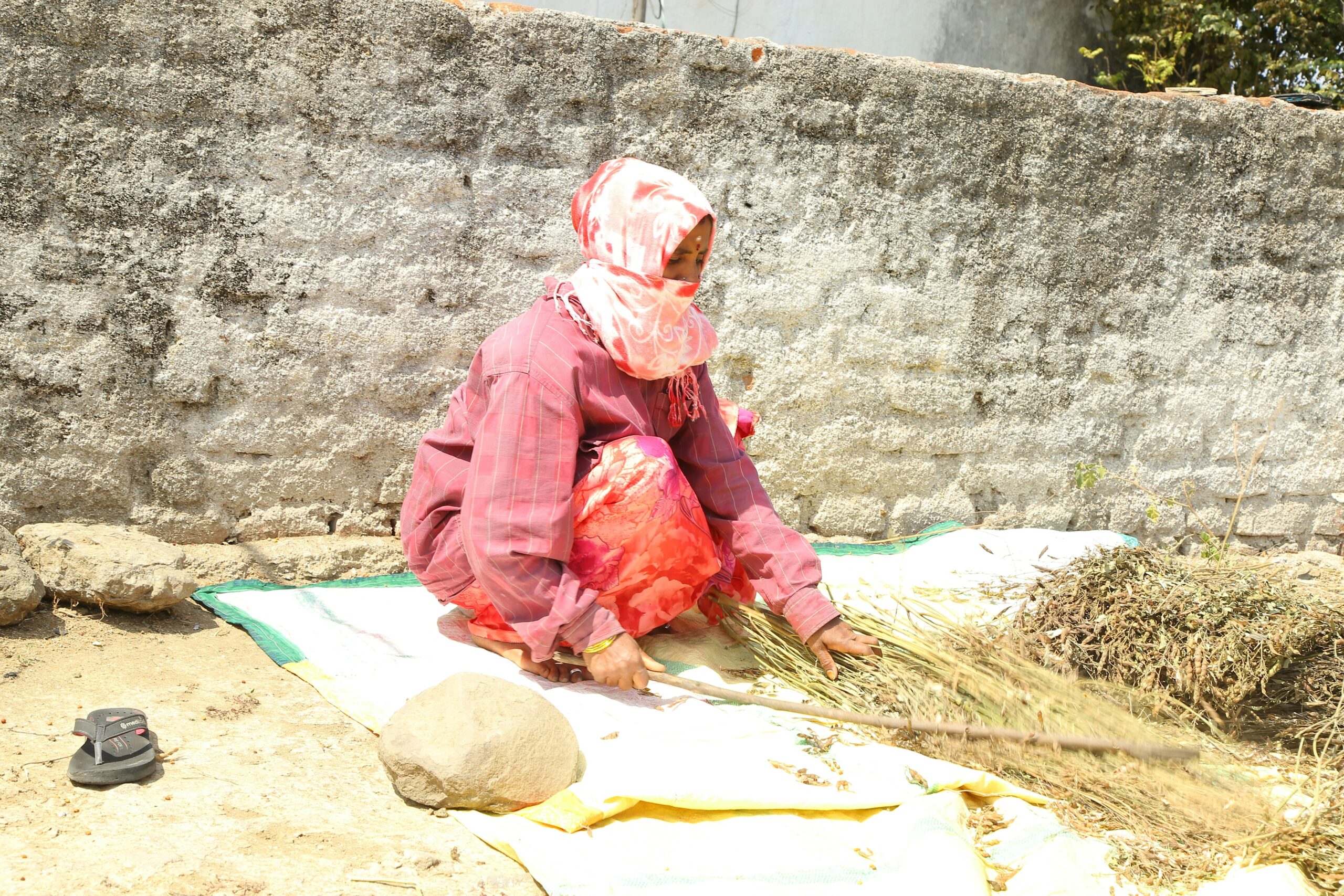 Woman wiping off melted foundation under extreme heat