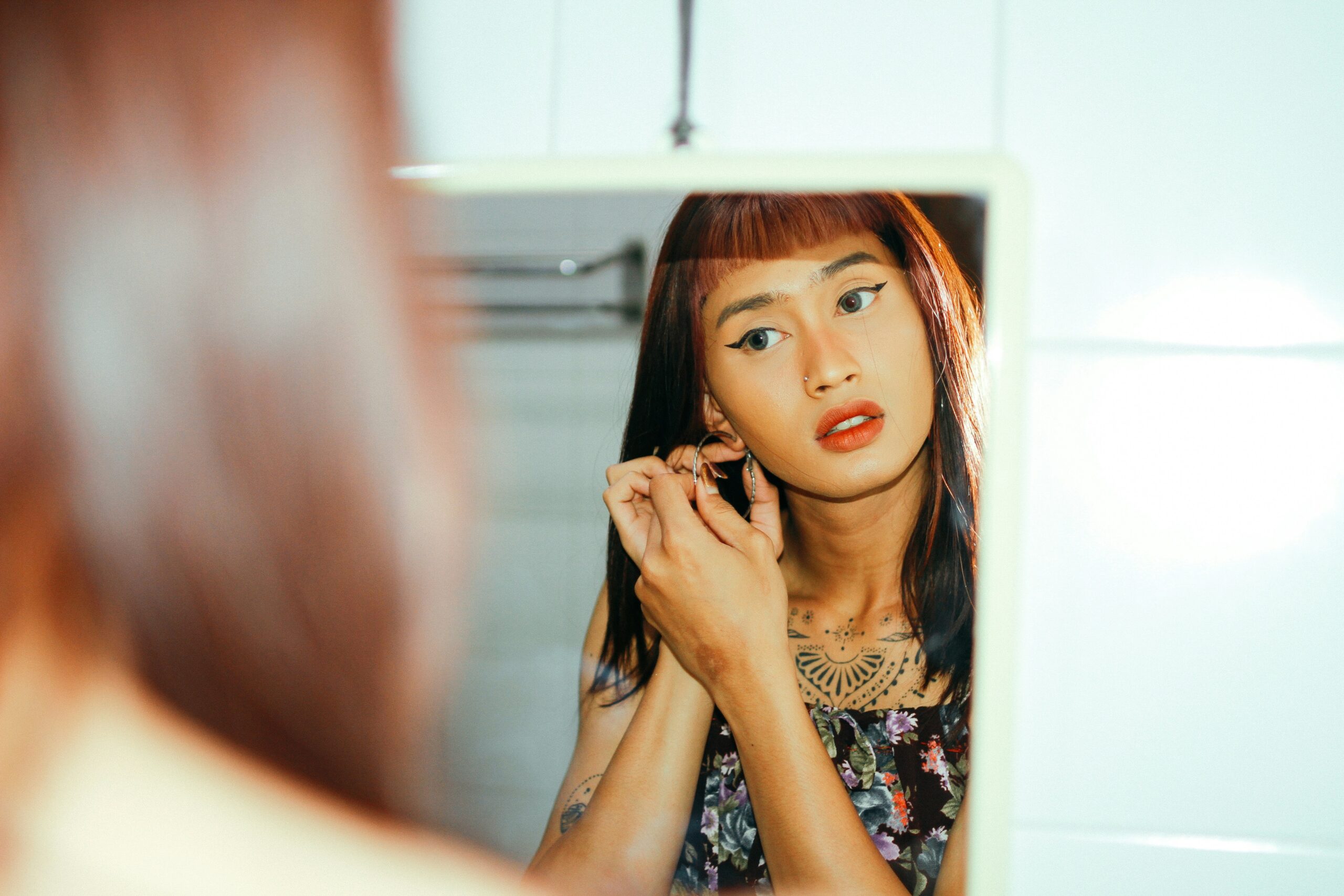 Before-and-after photo showcasing sweatproof makeup during physical activity
