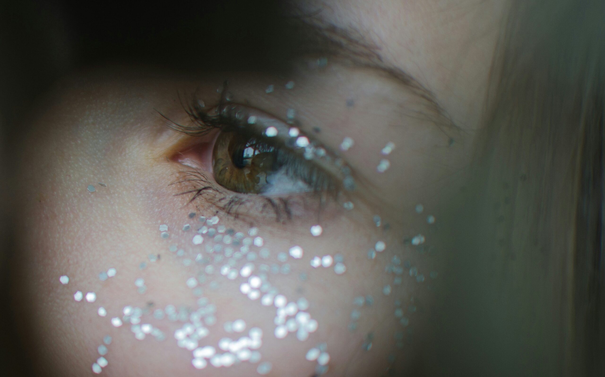 Before and after photo showing the difference between waterproof and non-waterproof mascara