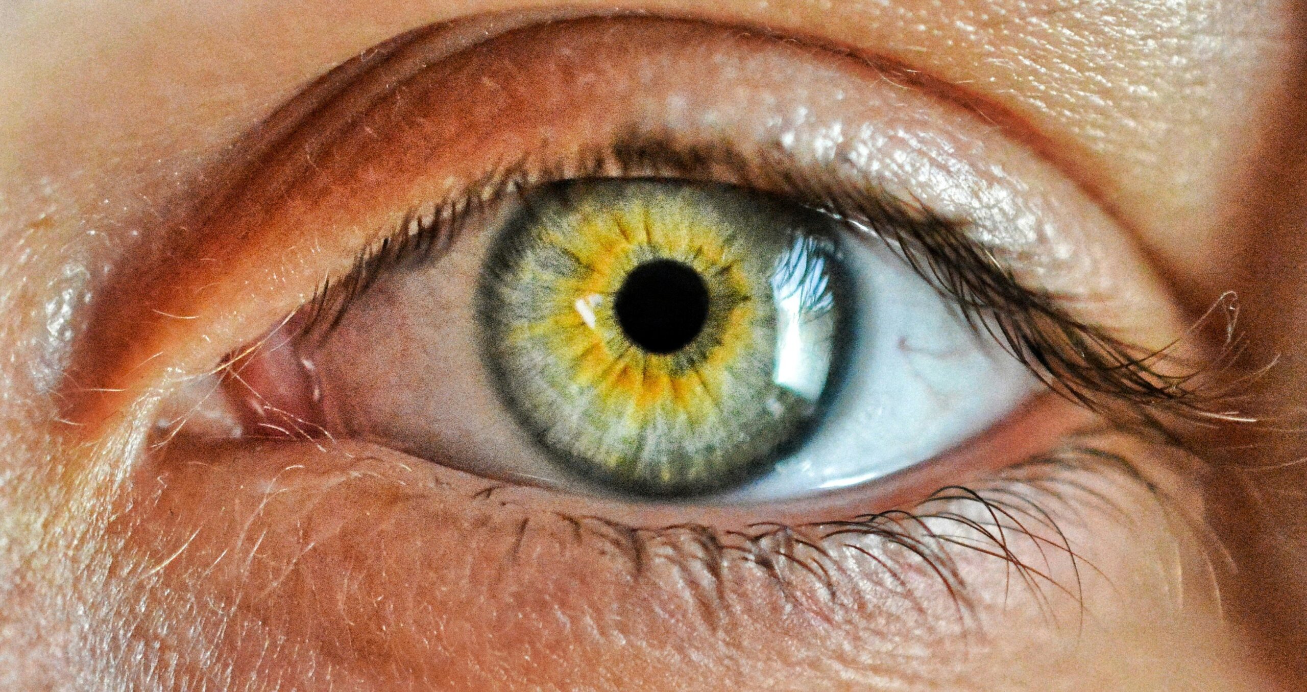 Side-by-side comparison of smudged and flawless eye makeup