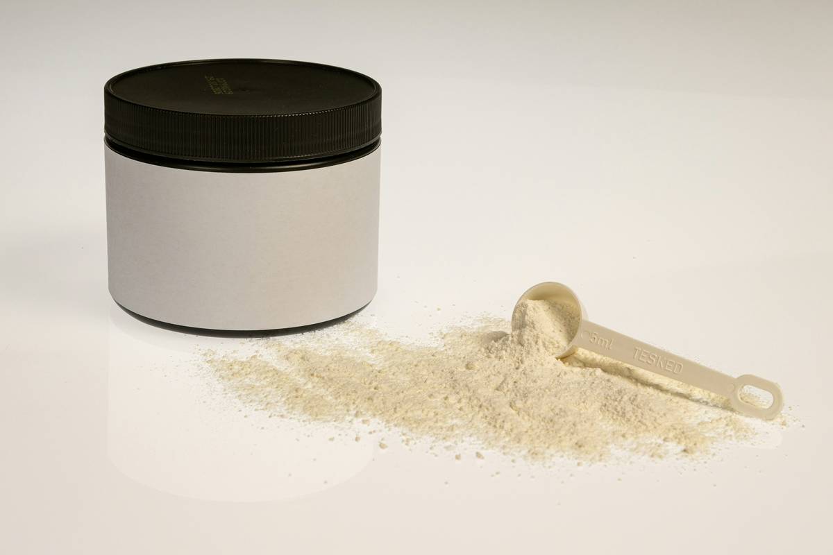 A split image showing a woman wearing waterproof makeup before and after using powder.