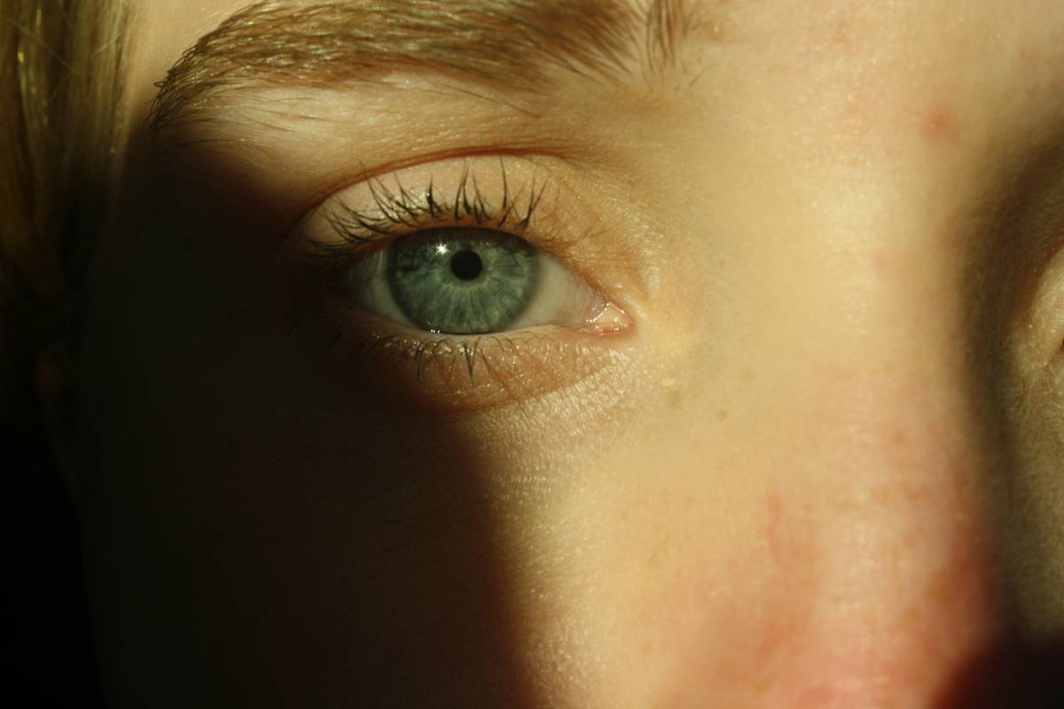 Before-and-after comparison showing smudge-free waterproof eye makeup results