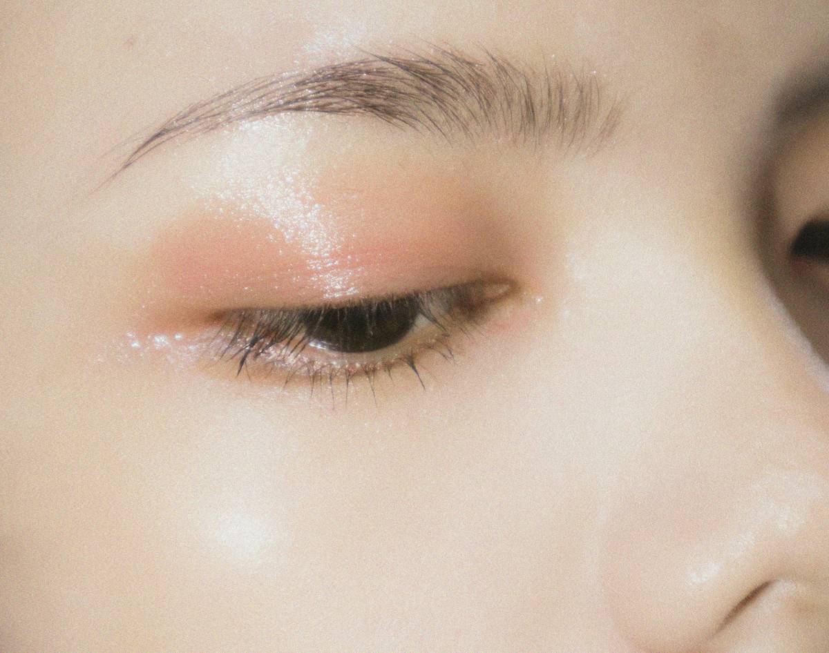 Woman wearing waterproof makeup while swimming
