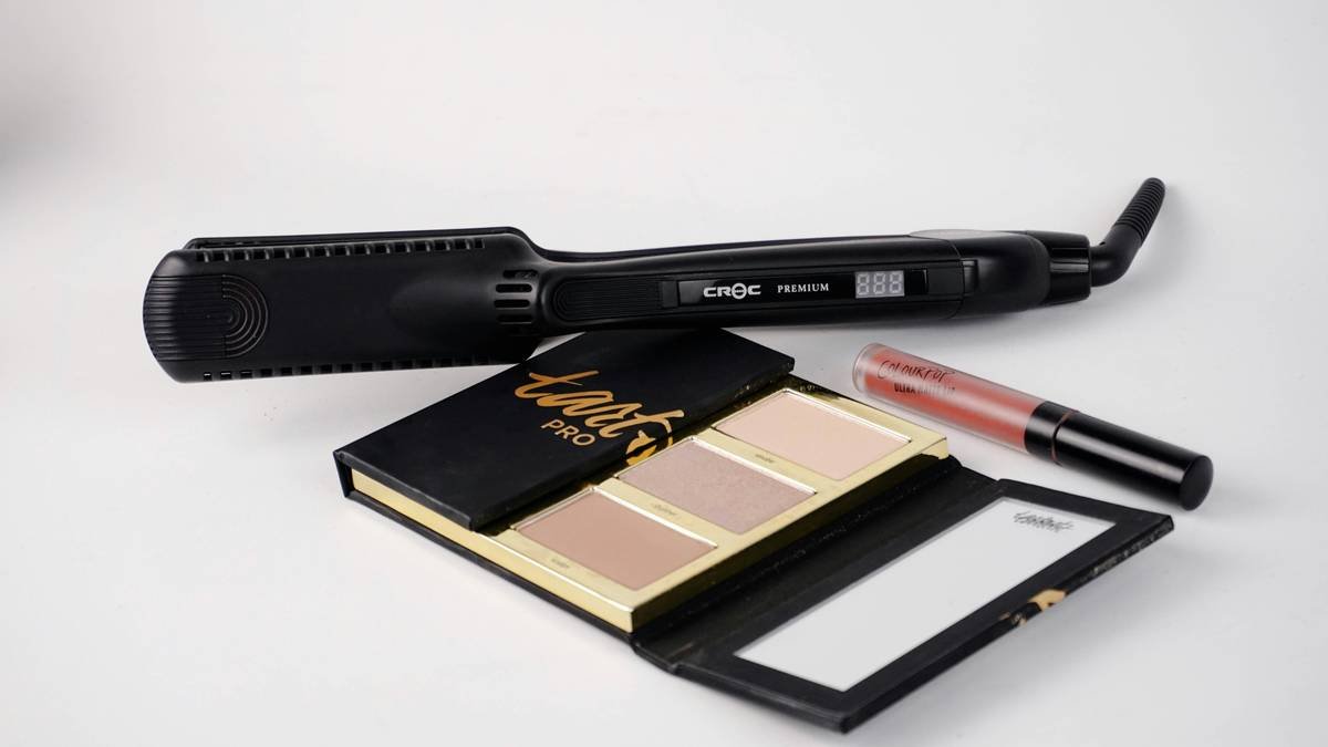 Woman applying heat proof balm to T-zone for summer makeup longevity