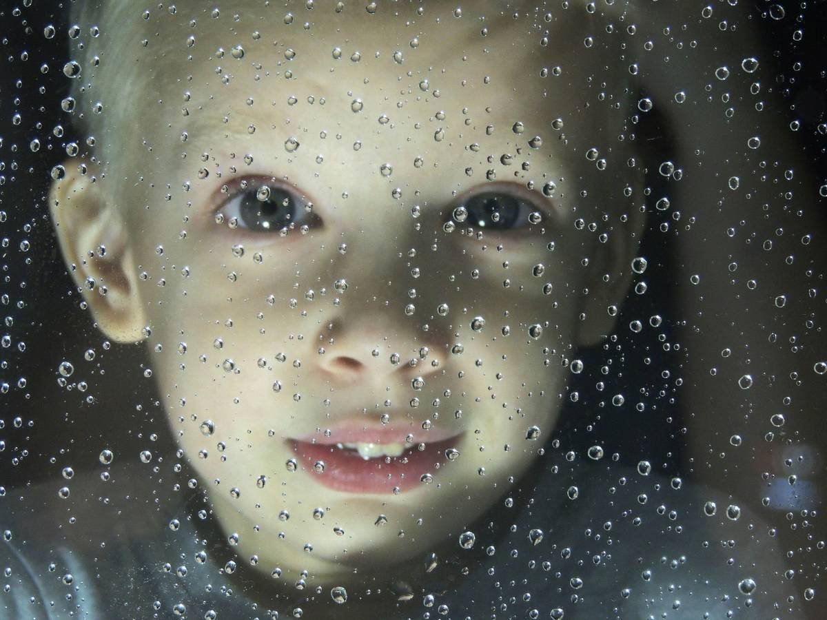 how to make something waterproof using primer, waterproof mascara, and setting spray on a model outdoors